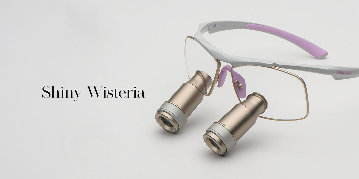 Loupes Univet Techne Prism colore Shiny Wisteria con montatura bianca e dettagli lilla per professionisti veterinari